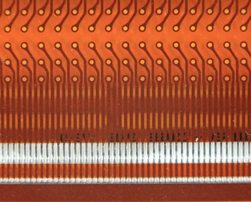 circuit contacts exposed by laser